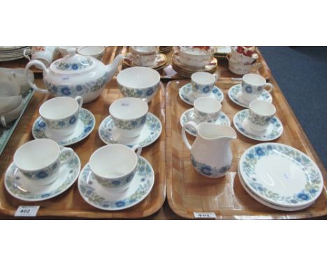 Two trays of Wedgwood bone china 'Clementine' teaware comprising: teacups and saucers; milk jug; sucrier; side plates and tea