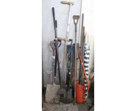 Collection of assorted gardening tools to include: spades; forks; rakes etc. (13)