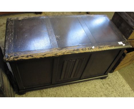 Reproduction stained oak trunk.