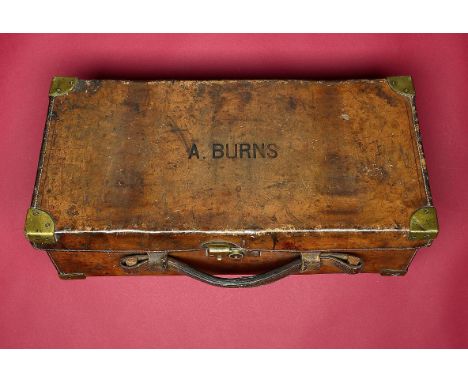 Shooting: A leather bound cartridge magazine with Army & Navy label  circa 1910 54cm.; 21¼ins by 26cm.; 10¼ins
