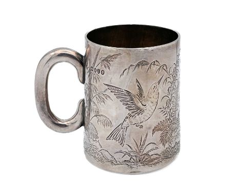 A Victorian silver Aesthetic design mug retailed by Goldsmiths Alliance Limited.  Engraved with two birds amongst bamboo and 