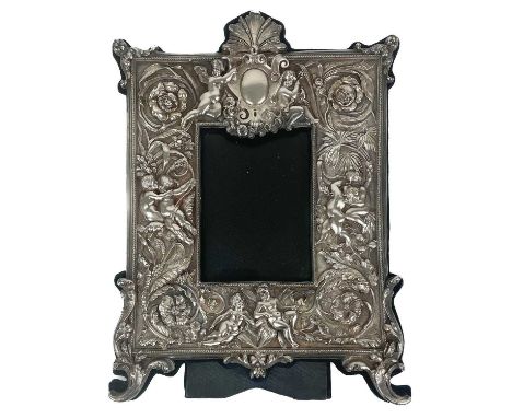 A remarkable  modern Britannia silver embossed photograph frame by Neil Lasher Silverware Ltd.  The silver front embossed and