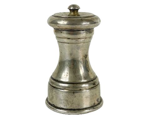 An Edwardian silver pepper grinder by Goldsmiths and Silversmiths Company. London 1903, height 9.5cm, weight overall 172g.