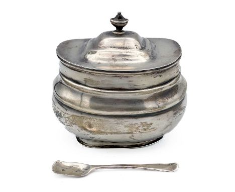 An Edwardian silver small hinge lidded tea caddy by William Hutton &amp; Sons. Of oval section, the lid with urn finial, Lond