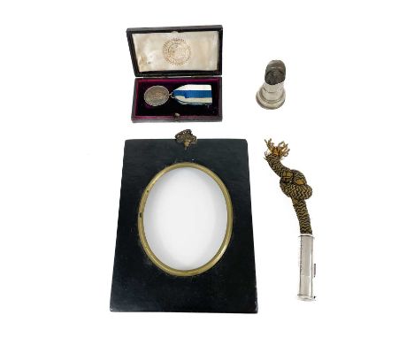 Various items to include a Silver trench tinder lighter. The lighter dated London 1909, Together with a silver commemoritive 