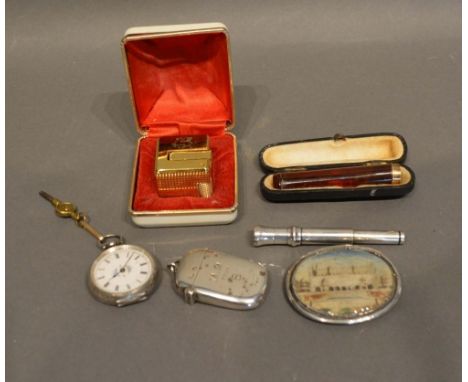 A Sheffield Silver Vesta Case, together with a silver cased fob watch, a cased cheroot holder, a cigar piercer, an oval brooc