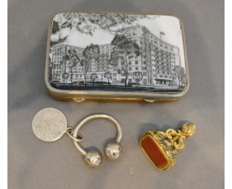 An Enamel Decorated Rectangular Box, together with a sterling silver keyring by Tiffany and a cornelian set fob seal 