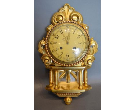A Carved Giltwood Cartel Wall Clock, 49cm long 