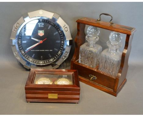 A Tag Heuer Style Wall Clock, together with a reproduction clock thermometer and a similar tantalus 