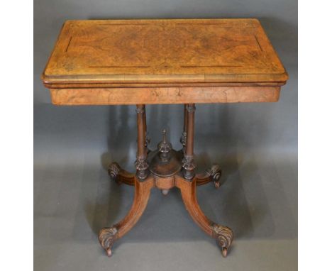 A Victorian Burr Walnut and Line Inlaid Rectangular Card Table, the hinged top enclosing a baize lined interior above a quadr