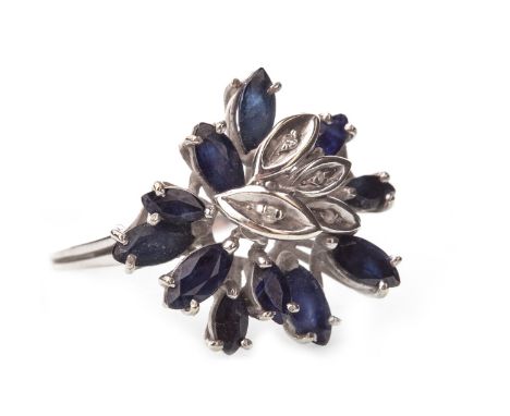 LARGE BLUE GEM AND DIAMOND CLUSTER RING, the spray bezel set with marquise shaped blue gems and diamonds, unmarked, size P 1/