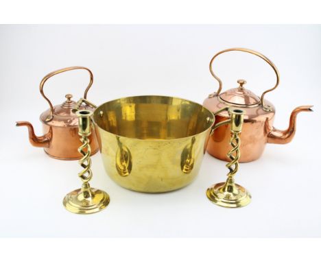 A collection of antique kitchenalia to include two copper kettles together with a brass jam pan and a pair of candlesticks, (