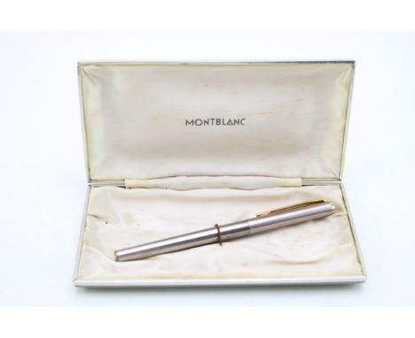 Cased Montblanc Noblesse Slimline Fountain Pen in a stainless steel and gold-tone metal barrel and cap, and 14k gold nib, len