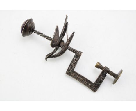 A quality c19th Victorian sewing clamp with velvet covered pin cushion &amp; an integral clip in the shape of articulated bir