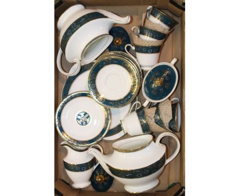 A collection of Royal Doulton tea ware in the Carlyle pattern to include two teapots, 6 cups, 6 saucers, 6 side plates, a lid