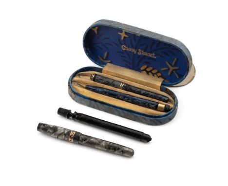 Conway Stewart - A vintage blue marble writing set comprising a "Dinkie" 526 with 14ct nib and pencil Duro Point No 2, contai