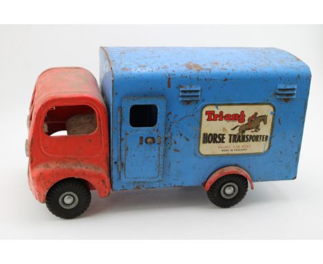 A Tri-ang horse transporter truck / wagon, blue and red colour-way, width 47cm, height 25cm.  In original paint, generally go