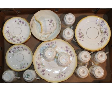 Royal Albert Crown China "Purple Violets" pattern, tea service items to include ten cups, twelve saucers, eleven 18cm side pl