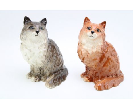 Two Beswick 1867 Sitting Persian cats in grey and ginger (2).  In good condition with no obvious damage or restoration.