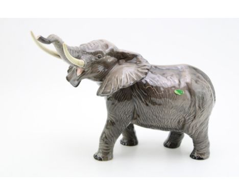 Large Beswick elephant with outstretched trunk (trunk af), 30cm long, collection only.