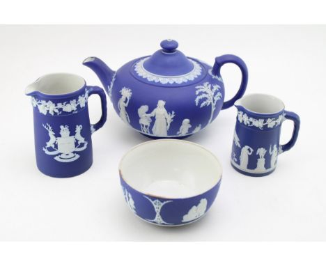 Wedgwood Jasperware, dip blue colourway, to include a teapot, a milk jug, a cream jug and a sugar bowl (4).  Generally good, 
