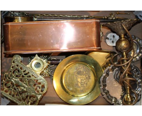 Metalware to include a copper rectangular planter (missing two feet), a brass candlestick, a brass fireside trivet and others