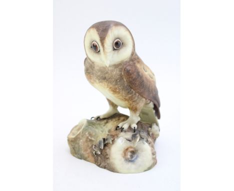 Royal Crown Derby figure of an Owl, raised naturalistic flowers, 16cm tall.  In good condition with no obvious damage or rest