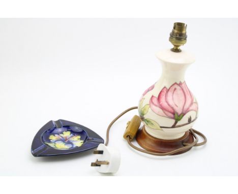 Moorcroft Hibiscus on Magnolia lampbase with a triangular clematis ashtray (2).  In good condition with no obvious damage or 