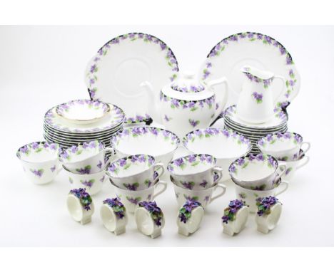 Royal Doulton tea ware c1930s, H3747 in the 'Violets' pattern to include, teapot (17cm tall), two 24cm x 22cm cake / sandwich