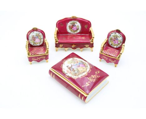 Limoges Fragunard novelty trinket boxes to include a sofa, two chairs and a book (4)., largest 12.5cm wide.  In good conditio