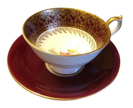Aynsley cup and saucer, floral decoration, gilt highlights (2).  In good condition with no obvious damage or restoration. Lig