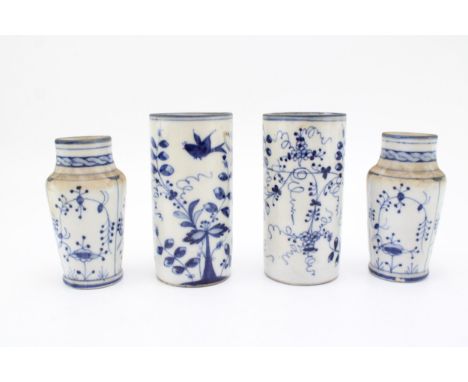 A collection of continental porcelain vases, blue and white oriental inspired decoration, with blue swords mark to bases, pro