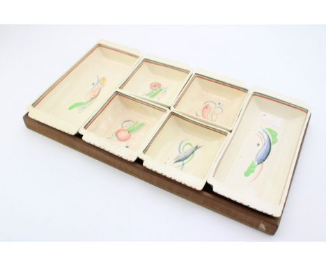 A Susie Cooper Hors D'oeuvres Set on Wooden Tray, 49cm Wide.  In good condition with no obvious damage or restoration.Provena