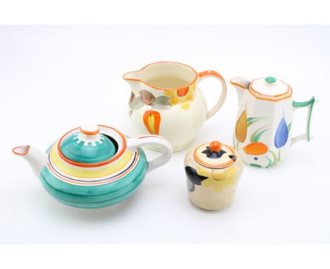 A Susie Cooper and Grays early teapot with colourful design, with three other pieces of Susie Cooper (4).  In good condition 