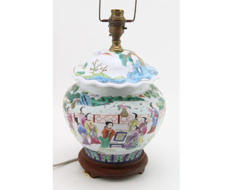 An early to mid 20th century Chinese famille rose lampbase, wooden base, 33cm tall.  In good condition with no obvious damage