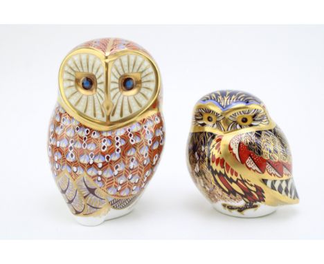 A Royal Crown Derby paperweight, Little Owl with lavish decoration in blue, red and gold feathers, highlighted by the use of 