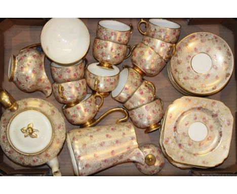 A collection of Grosvendor China tea ware, with pink rose / cabbage rose design, to include a teapot, a coffee pot, a cream j