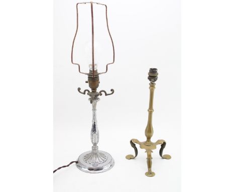 A cast brass Pullman lamp base, raised on three feet, with a chrome plated example (2), tallest 33cm tall.