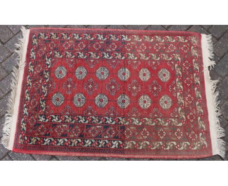 A quality Afghan Kayam style oriental wool rug / carpet measuring, 80cm by 125cm.  Excellent condition 80cm by 125cm. Provena