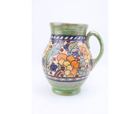 Charlotte Rhead for Crown Ducal: a large tubelined jug with single handle, forest design, 25.5cm tall.  In good condition wit
