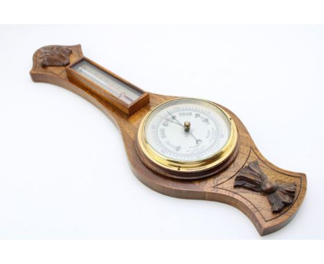 An early to mid 20th century banjo barometer, British Made, 58cm tall.