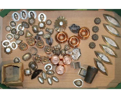 A collection of antique and vintage chocolate and catering moulds and accessories to include copper chocolate mould examples,