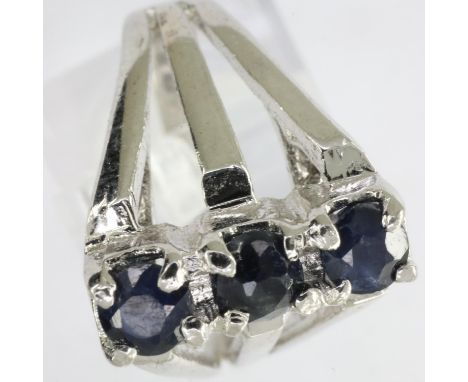 Hallmarked silver ring set with three sapphires, size L/M, 2.6g. UK P&amp;P Group 1 (£16+VAT for the first lot and £2+VAT for