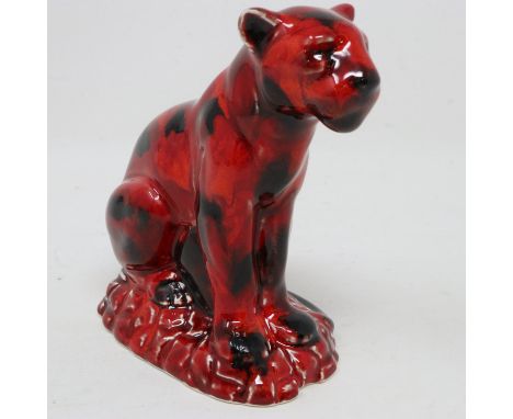 Anita Harris seated cougar, signed in gold, no cracks or chips, H: 11 cm. UK P&amp;P Group 1 (£16+VAT for the first lot and £