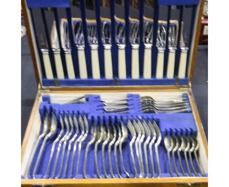 Oak cased forty nine piece canteen of silver plated and stainless steel cutlery by Fattorini and Sons, Sheffield. UK P&amp;P 