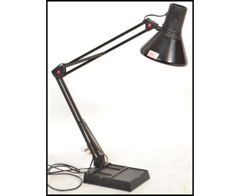 A 20th century retro black anglepoise desk lamp in black colourway having squared weighted base with pendant shade on adjusta