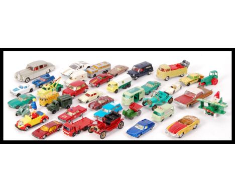 A collection of approx 30 assorted scale diecast model vehicles by Dinky , Matchbox Lesney , Ertl and Corgi with others. All 