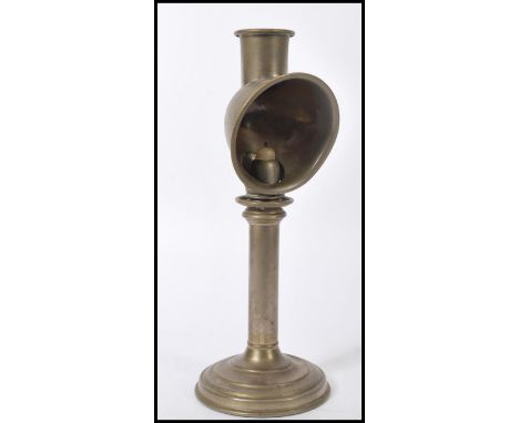A vintage early 20th century Sherwood of Birmingham candle lamp of unusual form having an adjustable neck and shade.