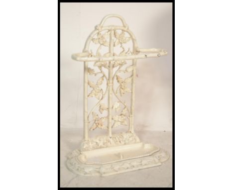 A 19th century Victorian Coalbrookdale cast iron stick stand having floral decoration with leaves and scrolls. The stand havi