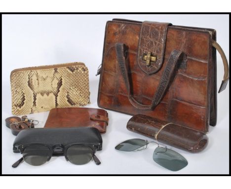 A group of vintage fashion items to include a crocodile / alligator skin hand bag, Buffalo calf wallet, snakeskin purse and t